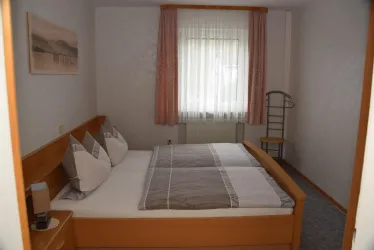 Schlafzimmer (© Gästehaus Hammer)