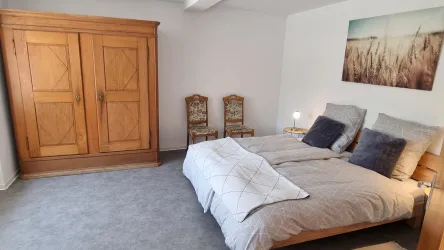 Michel_Living_Ferienwohnung_Sonne_Schlafzimmer2023
