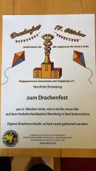 Ein einladendes Plakat für das Drachenfest in Bad Sobernheim. Es zeigt Informationen zum Veranstaltungstermin sowie Aktivitäten für Groß und Klein.