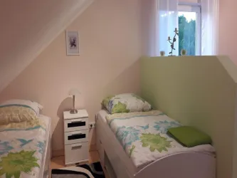 Schlafbereich mit 2 Einzelbetten Apartement 3 OG