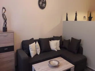 Wohnbereich mit Schlafsofa Apartement 1
